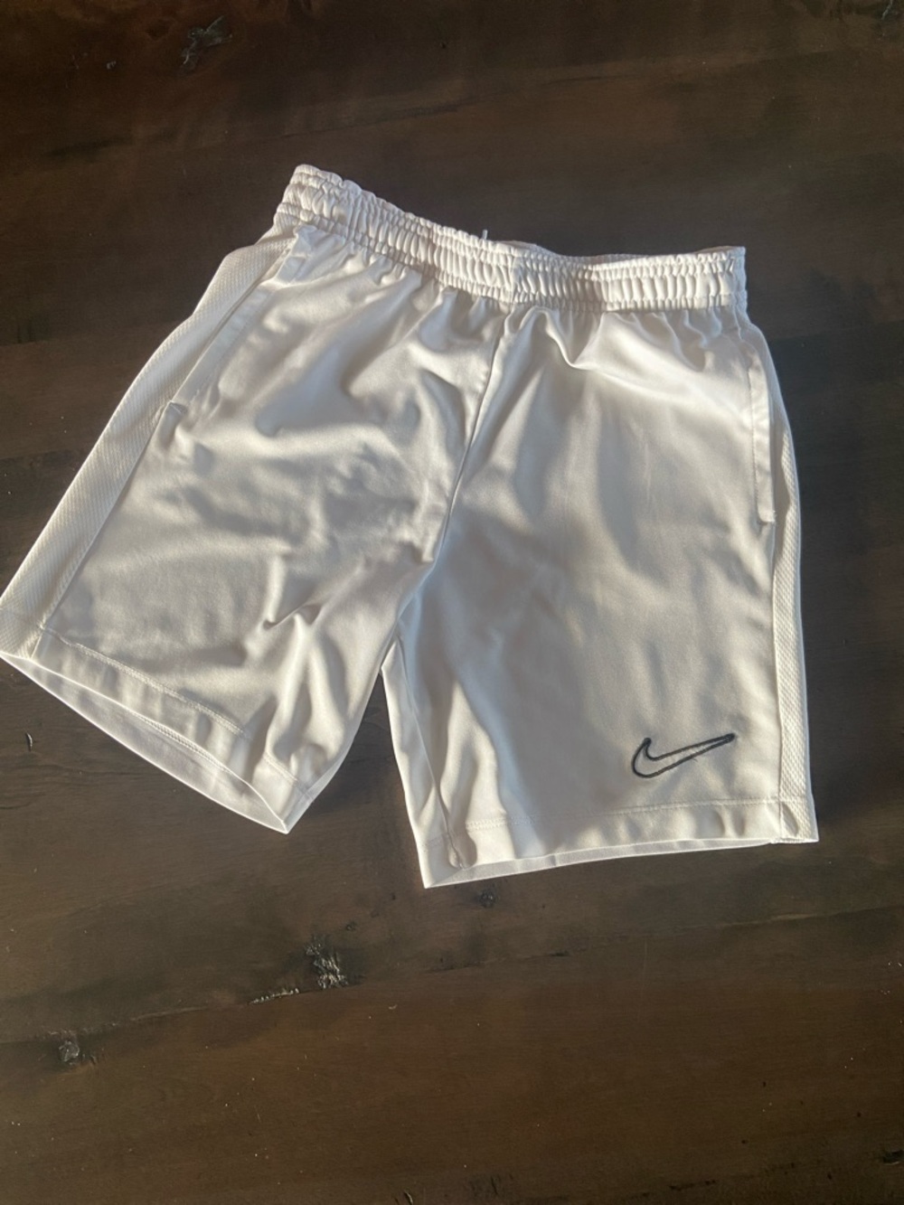 Nike  Kids White Athletic Shorts with Black Swoosh